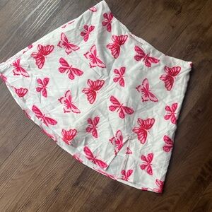 Satin white pink butterfly mini skirt.